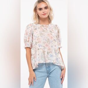 Soft neutral light vintage floral blouse, short sleeves, layered bottom, and bow